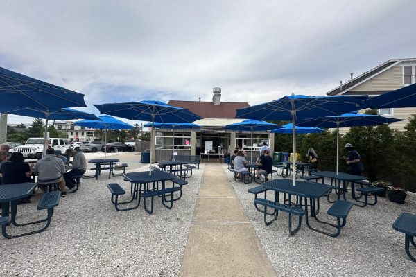 Picnic seating at the casual "Viking Fresh Off the Hook" | Image by The Guarino Team