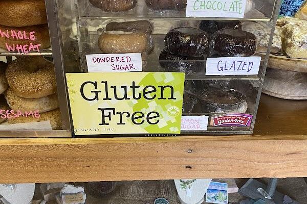 a display case with gluten-free donuts at Surfside Coffee House