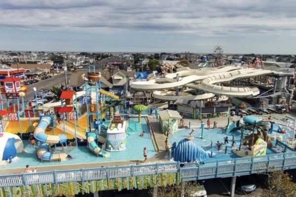 an aerial view of a waterpark with multiple slides and pools